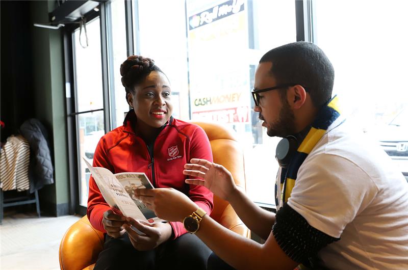 A client being informed about the services